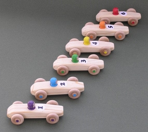 Yellow RAINBOW RACER, #4.  Wooden toy race car.